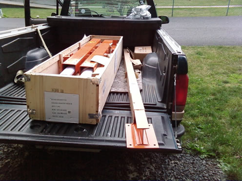 On the truck at home.  Gross weight of the crane is slightly over 600lbs.